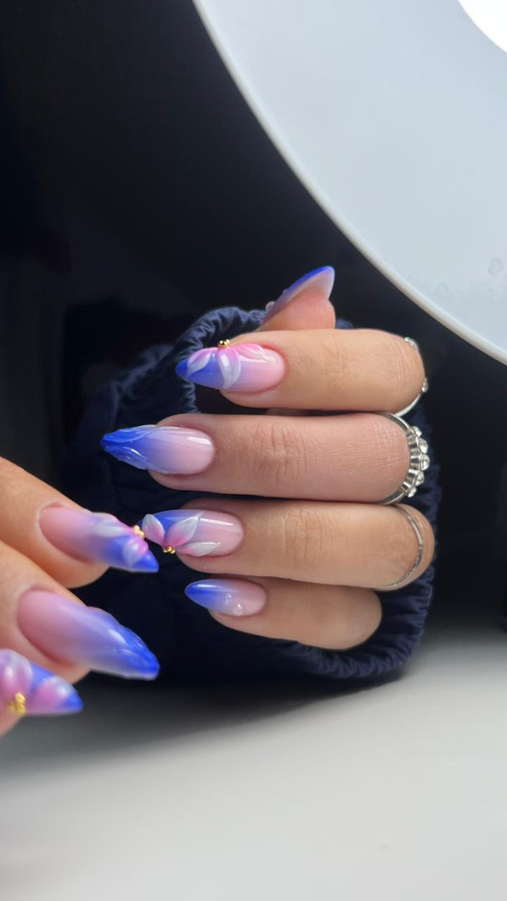 Blue and pink almond nails with floral art