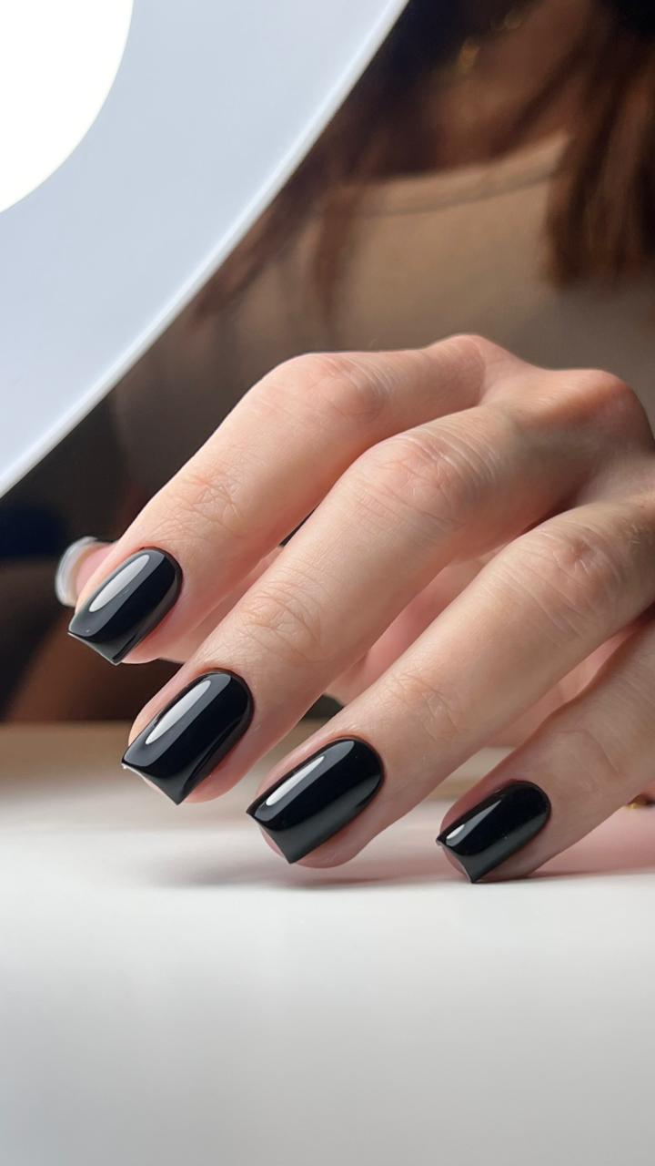 Glossy jet-black square nails