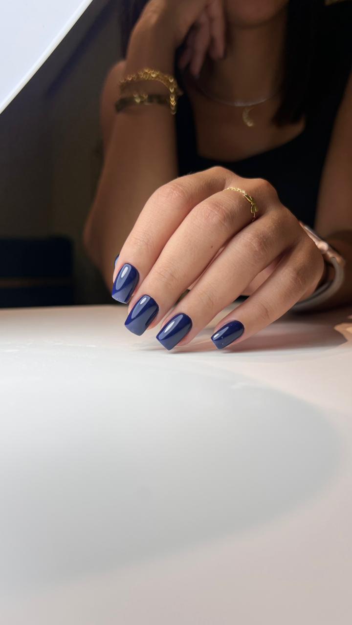 Glossy navy-blue square nails