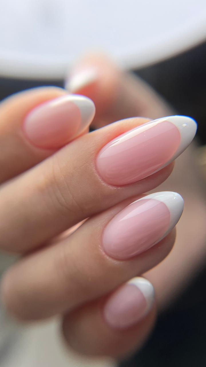 Classic white French almond nails